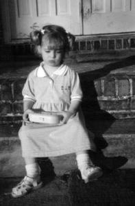 Miss Puppy Tails on the Front Steps  (c. 1995)