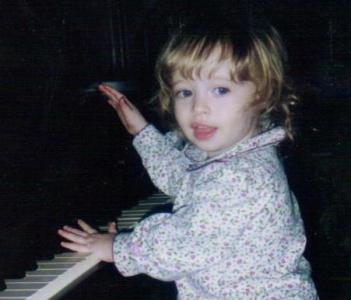 Sarah Trying to Play Piano  (c. 1995)