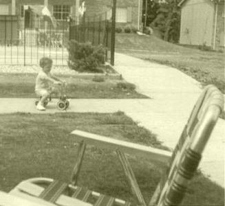 Michael Riding a Tyke-Bike at Charter East  (c. 1970)